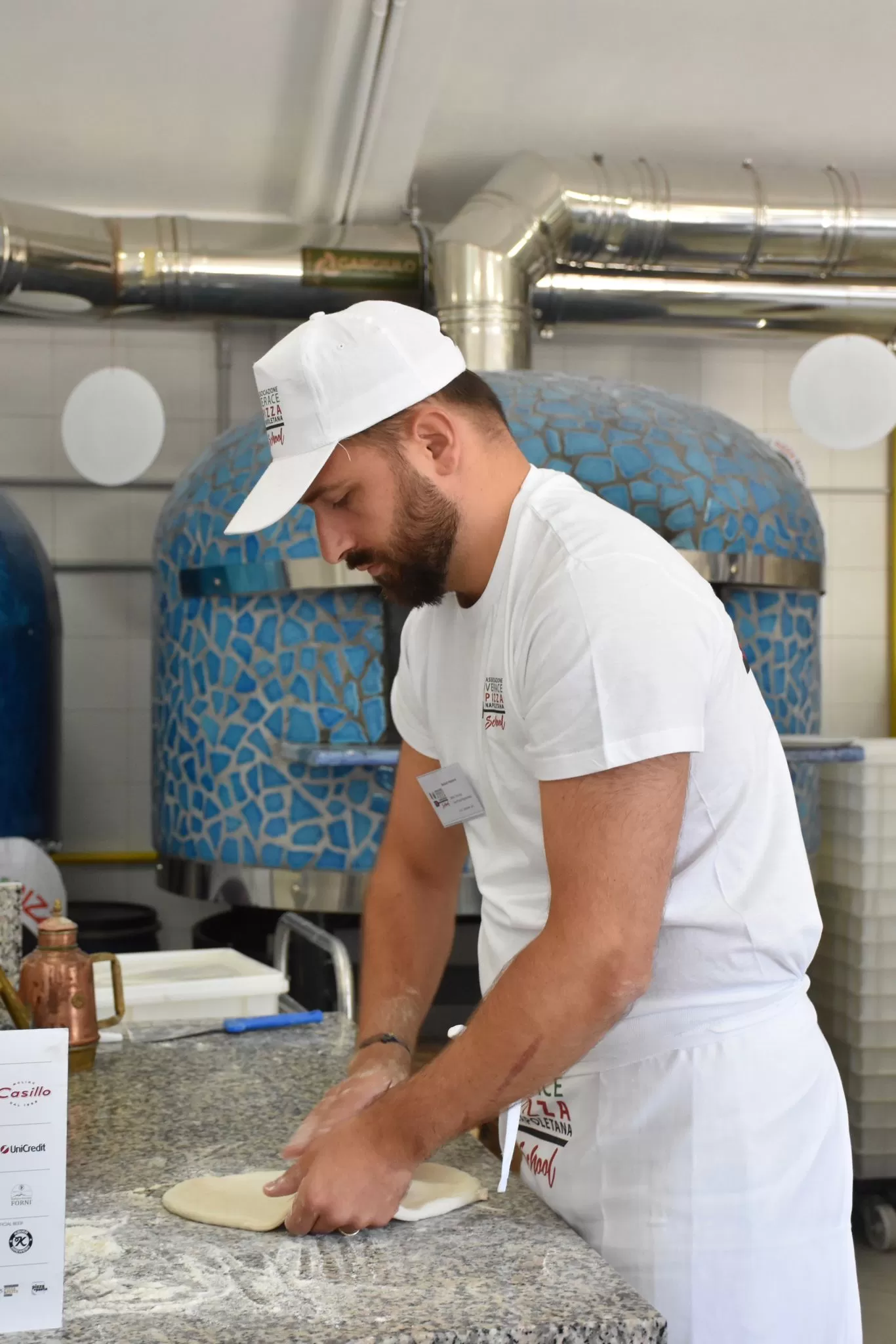 Maxence fait sa propre pâte à pizza (et ses propres pâtes aussi) @Squadra Club